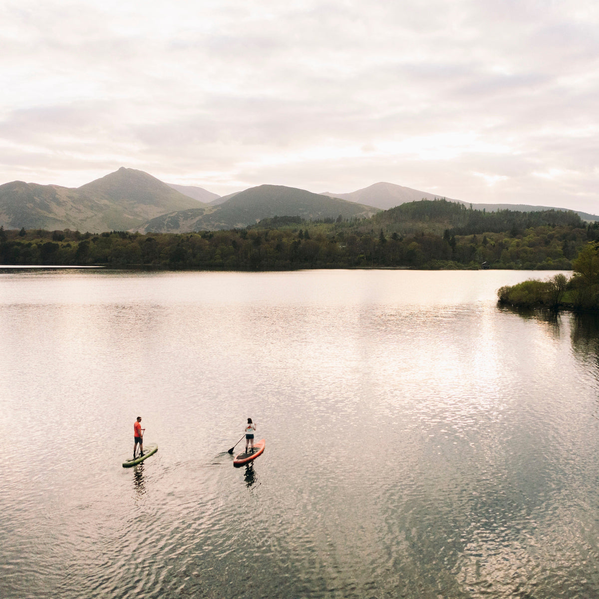 Alpkit Delta and Longshore stand up paddleboards in use - closed