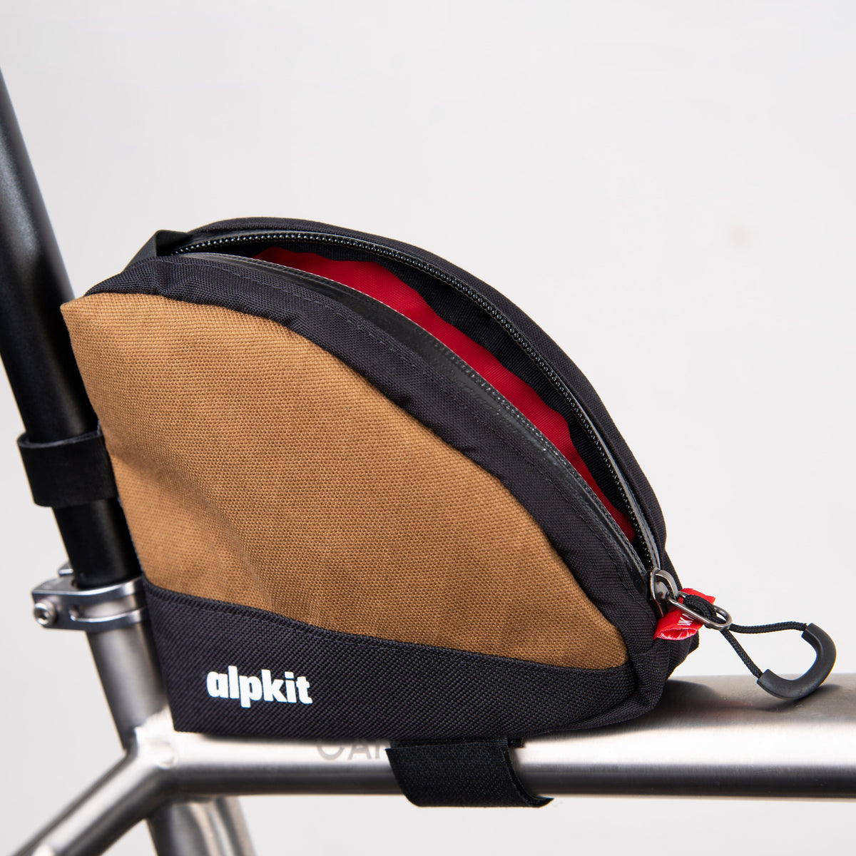 alpkit fuel pod rear bikepacking bag in mountain brown open