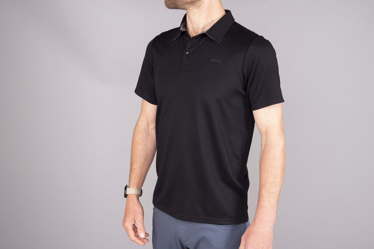 mens alpkit cabrera polo in black front - closed
