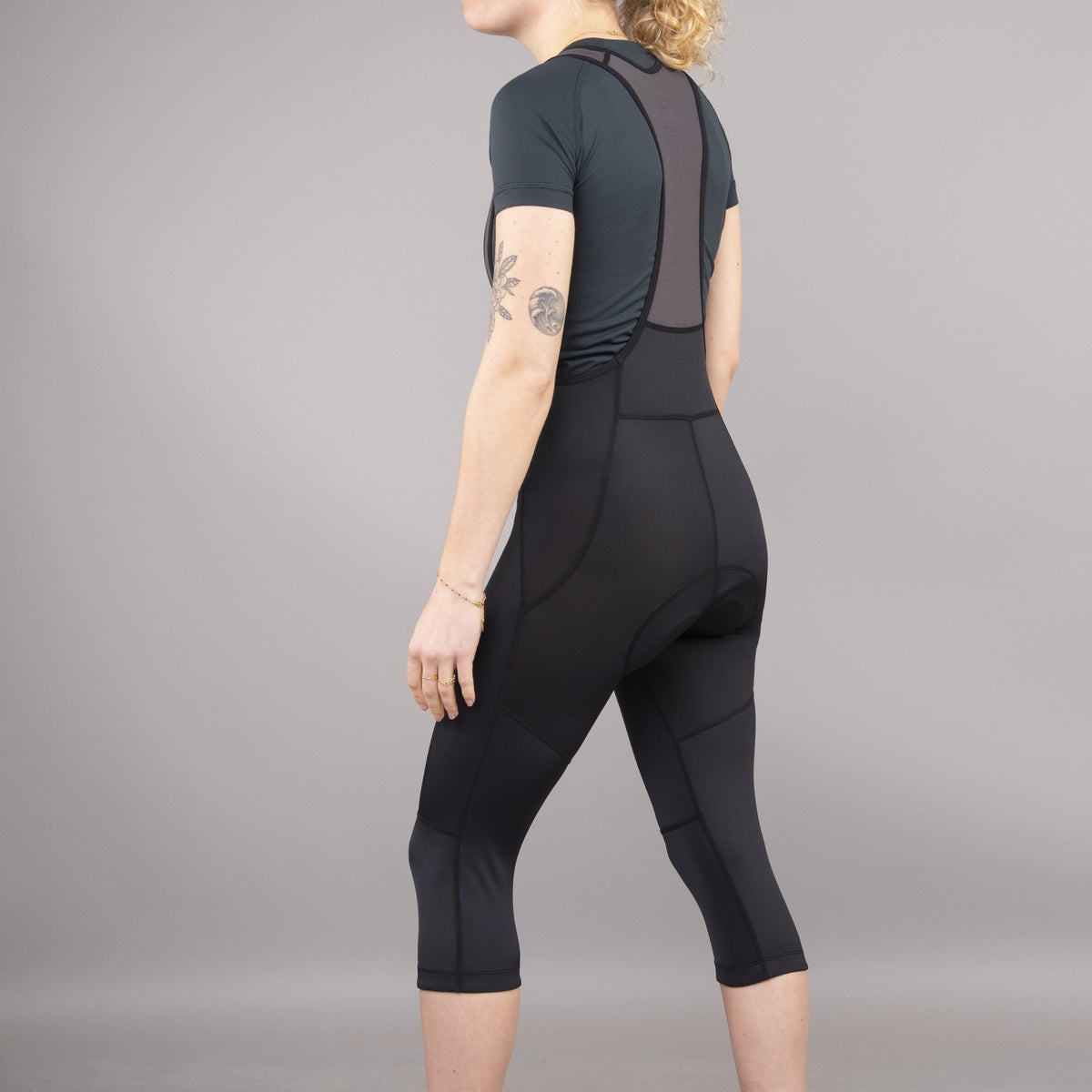 womens rhythm bib 3/4 rear