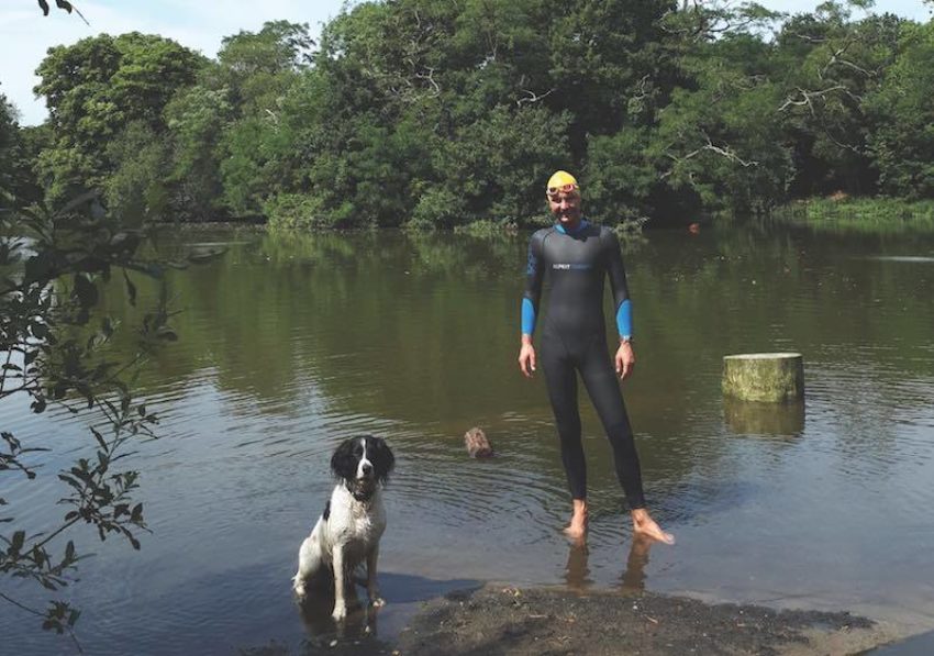 Outdoor Swimmer testing swimming wetsuits