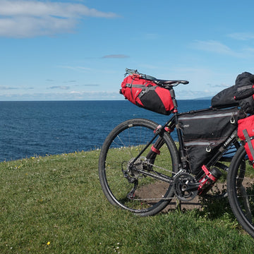 Female bikepackers in the Cairngorms