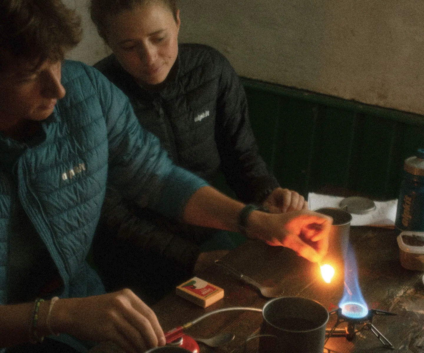 Bikepackers cooking a meal