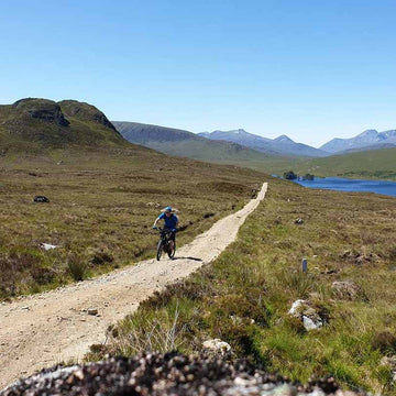 Female bikepackers in the Cairngorms