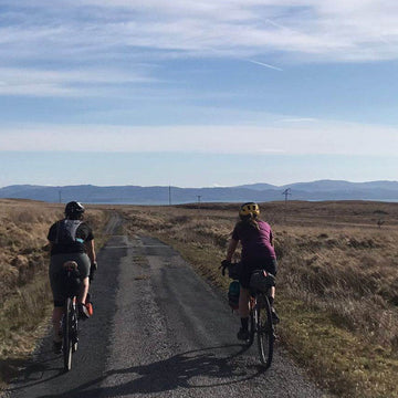 Female bikepackers in the Cairngorms