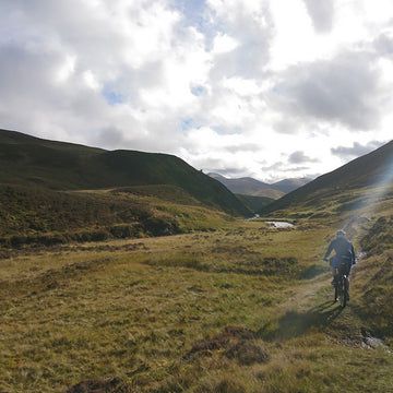 Female bikepackers in the Cairngorms