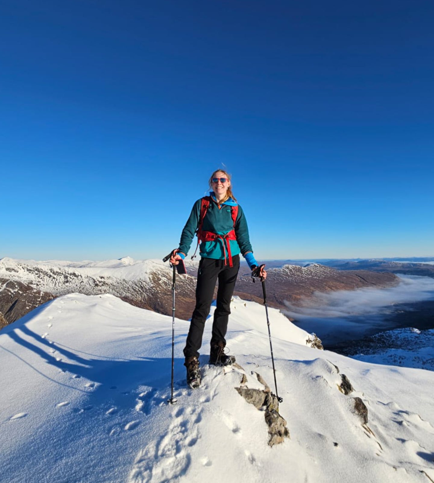 Anna Wells summiting during her winter munro challenge