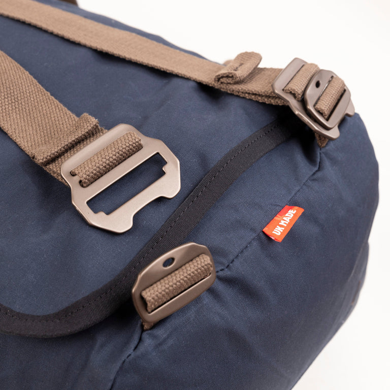 alpkit idaho 30 duffle bag in navy blue strap buckle