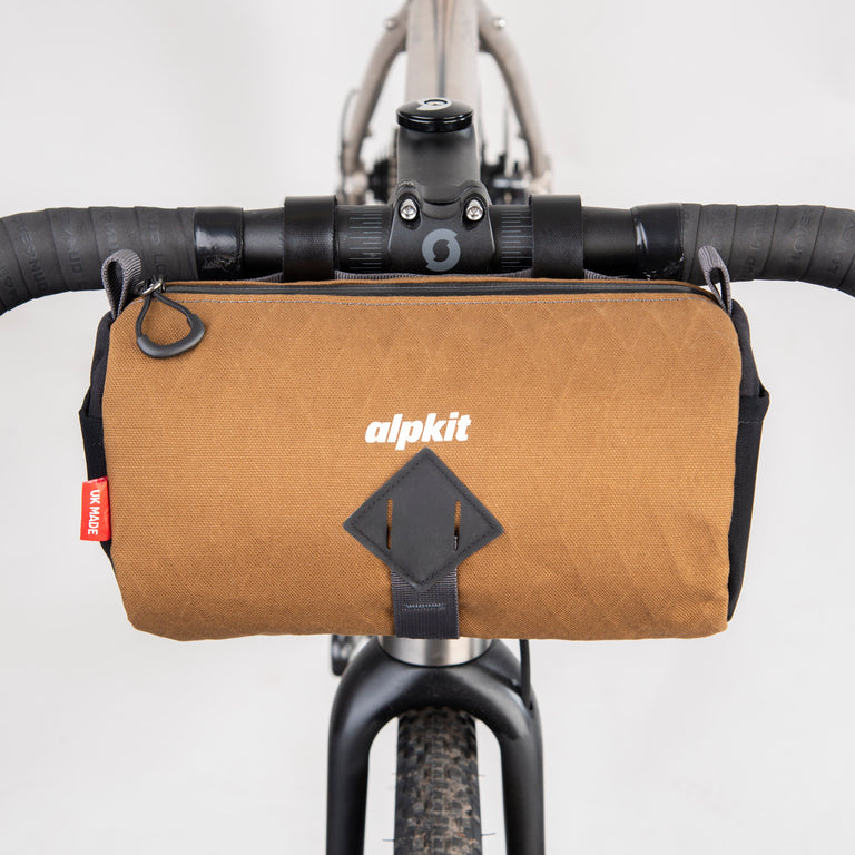 alpkit toploader zipped handlebar bag in mountain brown top