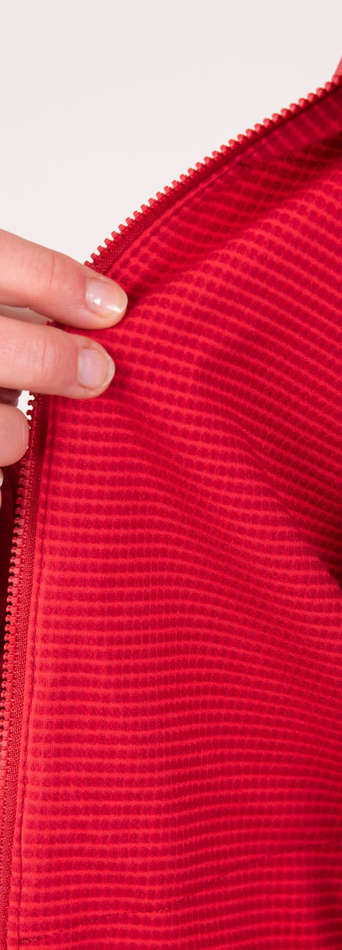 Alpkit women's Morphosis windproof jacket in Chilli red fleece lining - closed